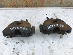 Суппорт тормозной. Opel Astra