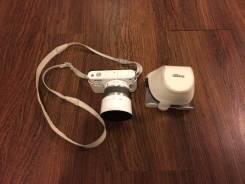 Nikon 1 J1. 20 и более Мп, зум: 10х