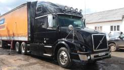 Volvo. Продается Тягач VNL670 c бортовым тентованным полуприцепом, 15 000 куб. см., 30 000 кг.