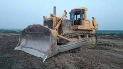 Komatsu D375A. 2, 10 000 куб. см., 64 500,00 кг.