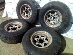 Крутые литые диски на шинах Yokohama 265/70R15. 6.0x15" 6x139.70 ET-10