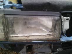 Фара. Mazda 323