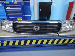 Планка под фары. Toyota Land Cruiser, FZJ100, FZJ105, HDJ100, HDJ100L, HDJ101, HDJ101K, HZJ105, HZJ105L, UZJ100, UZJ100L, UZJ100W Двигатели: 1HDFTE, 1...