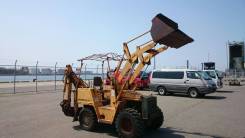Yanmar. Фронтальный погрузчик-экскаватор