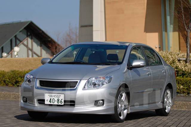 Губа переднего бампера левая Toyota Corolla e12 04-06 5d 3d 76852-02080