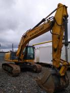 New Holland E215C. Экскаватор