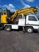 Isuzu Elf. Продам экскаватор-бурилку