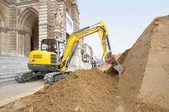 Wacker Neuson. Гусеничный экскаватор с нулевым выносом задней части . Под заказ