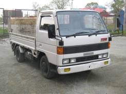 Mazda Titan. Бортовой грузовик с аппарелью .1990 г. в. Без пробега по РФ., 3 000 куб. см., 2 000 кг.