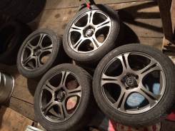 Литье "Bridgestone" 17" 5x114,3 на летней резине 215/50-17". 6 шт. 7.0x17" 5x114.30 ET38 ЦО 73,1 мм.