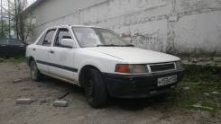 Mazda Familia. механика, передний, 1.3, бензин