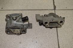 Корпус термостата. Renault: Kangoo, Megane, Logan, Dokker, Clio, Sandero Лада Ларгус, F90, R90 Двигатели: E7J, K7J, K7M, K4M, BAZ11189, BAZ21129