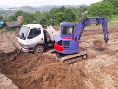 Komatsu PC38UU-2. , 0,12 куб. м.