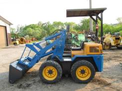 Komatsu. Погрузчик SK07, Дизельный, 0,35 куб. м.