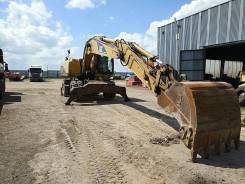 Caterpillar. Колесный экскаватор M318C, 2006 Г. В.
