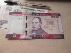 Доллар Либерийский.
