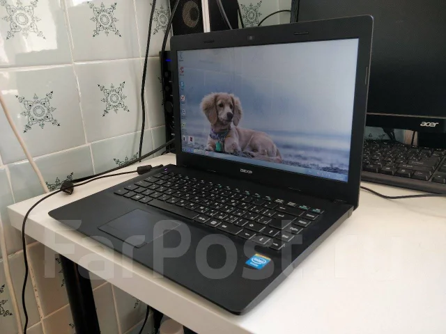 DEXP Athena. 14", 2,2����, ��� 4 ��, ���� 500���, WiFi: 1, Bluetooth: 1, ����������� �� 4��. ����