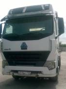 Howo A7. , 12 000 куб. см., 32 000 кг.