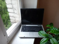 Toshiba Satellite A100. 15.4", WiFi ����