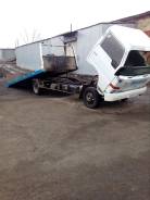 Nissan Atlas. Эвакуатор со сдвижной платформой, 3 500 куб. см., 3 000 кг., 4x2