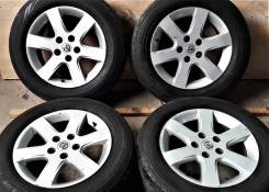 Dunlop Le Mans LM704 205/65R15 + Литьё Nissan 5x114.3. 6.5x15" 5x114.30 ET40 ЦО 63,0 мм.