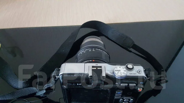 Olympus Pen E-PL1. 10 - 14.9 �� ����