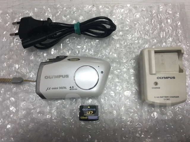 Olympus Stylus Mini. 4 - 4.9 �� ����