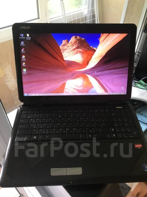 Asus K51AE. 15.6", 2,2����, ��� 2048 ��, ���� 320���, WiFi: 1, Bluetooth: 1, ����������� �� 1��. ����
