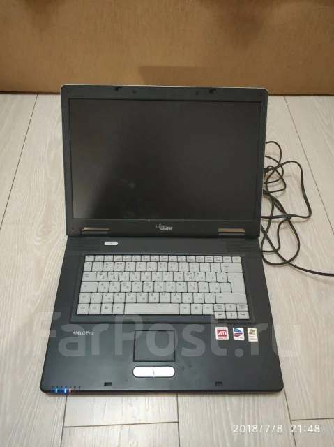 Fujitsu Amilo Pro V3515. 15", 1,7����, ��� 512 ��, WiFi: 1, Bluetooth: 1, ����������� �� 100��. ����