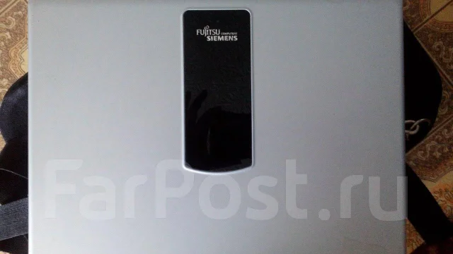 Fujitsu Amilo. 15.4", 1,7����, ��� 1024 ��, ���� 80���, WiFi: 1, Bluetooth: 1, ����������� �� 1��. ����