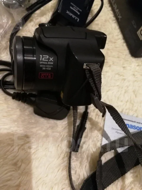 Panasonic Lumix DMC-FZ7. 9 - 9.9 ��, ���: 12� ����