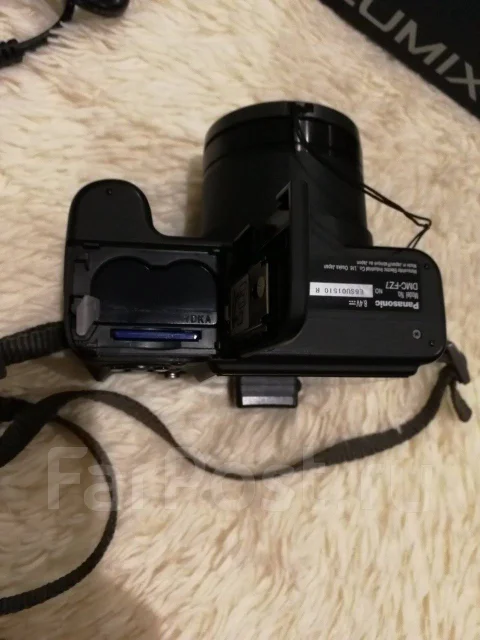 Panasonic Lumix DMC-FZ7. 9 - 9.9 ��, ���: 12� ����