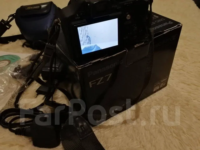 Panasonic Lumix DMC-FZ7. 9 - 9.9 ��, ���: 12� ����