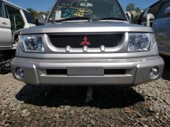 Планка под фары. Mitsubishi Pajero, H65W, H66W, H76W Mitsubishi Pajero iO, H61W, H65W, H66W, H71W, H76W Mitsubishi Montero, H65W, H66W, H76W Двигатели...