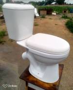 Унитазы.