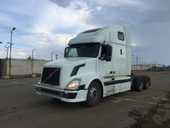 Volvo VNL 670. Вольво внл тягач седельный 2004, 15 000 куб. см., 26 000 кг., 6x4