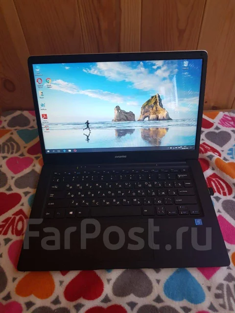 Digma EVE 1401. 14", ��� 2048 ��, WiFi: 1, ����������� �� 6��. ����