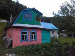 Продам дом в Партизанске. Улица Зарудничная, р-н первой шахты, площадь дома 80 кв. м., скважина, электричество 13 кВт, отопление твердотопливное, от ч...