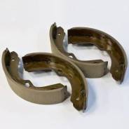 Колодки тормозные. Mitsubishi 1/2T Truck, V16B Mitsubishi Strada, K74T Mitsubishi L200, K57T, K66T, K72T, K74T, K75T, K76T, K77T Mitsubishi Delica, PB...