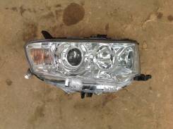 Фара. Mitsubishi Pajero Sport