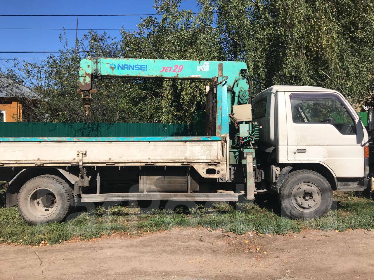 Кран-борт пермь. Манипулятор исузу nqr75. Камаз кран борт. Камаз кран борт. Манипулятор выборг.