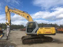 New Holland. Продам экскаватор с гидромолотом E265B, 2008 г. в., 1,20 куб. м.
