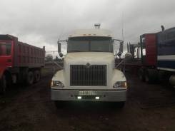 International 9400i. Продается тягач +полуприцеп с гидроманипулятором, 14 945 куб. см., 39 000 кг.