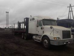 International 9400i. Продается тягач +полуприцеп с гидроманипулятором, 14 945 куб. см., 39 000 кг.