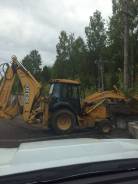 John Deere. Экскаватор-погрузчик