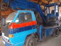 Isuzu Elf. Автоэксковатор, 3,10 куб. м.