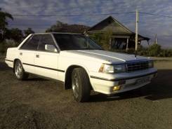 Nissan Laurel. автомат, задний, 2.0 (125 л.с.), бензин
