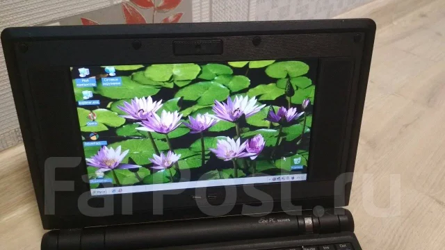 Asus Eee PC 701. 7", 1����, ��� 1024 ��, ���� 4���, WiFi: 1, Bluetooth: 1, ����������� �� 5��. ����