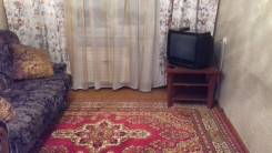 Гостинка, улица Октябрьская 19/2. Детской поликлиники, 17 кв. м. Комната