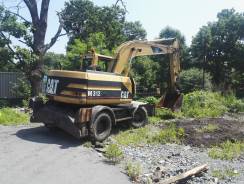 Caterpillar. Колесный экскаватор CAT M312, 0,76 куб. м.